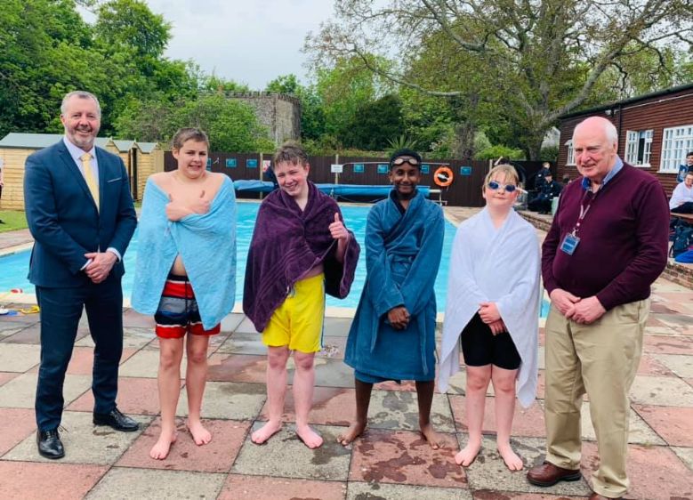 slindon college swimming gala winners with Mr Birkbeck, Headmaster and Mr Slee, Chair of Governors