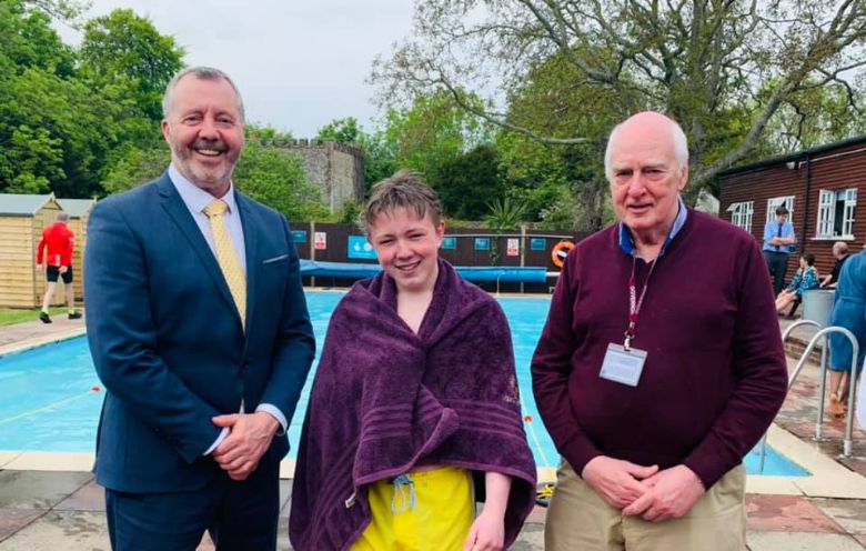 slindon college swimming gala winner with headmaster and chair of governors